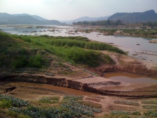 Looking across the Mekong river to Laos. (Note the riverside gardens!)