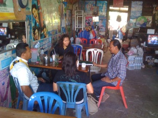 Meeting with Khun Suwit at the wooden noodle shop.