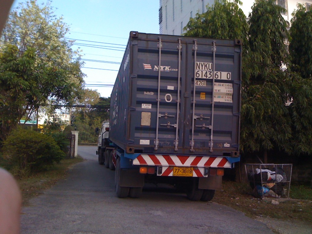 The container full of canoes.