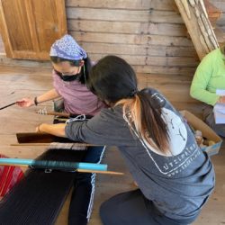 Learning how to weave on a traditional Karen backstop loom